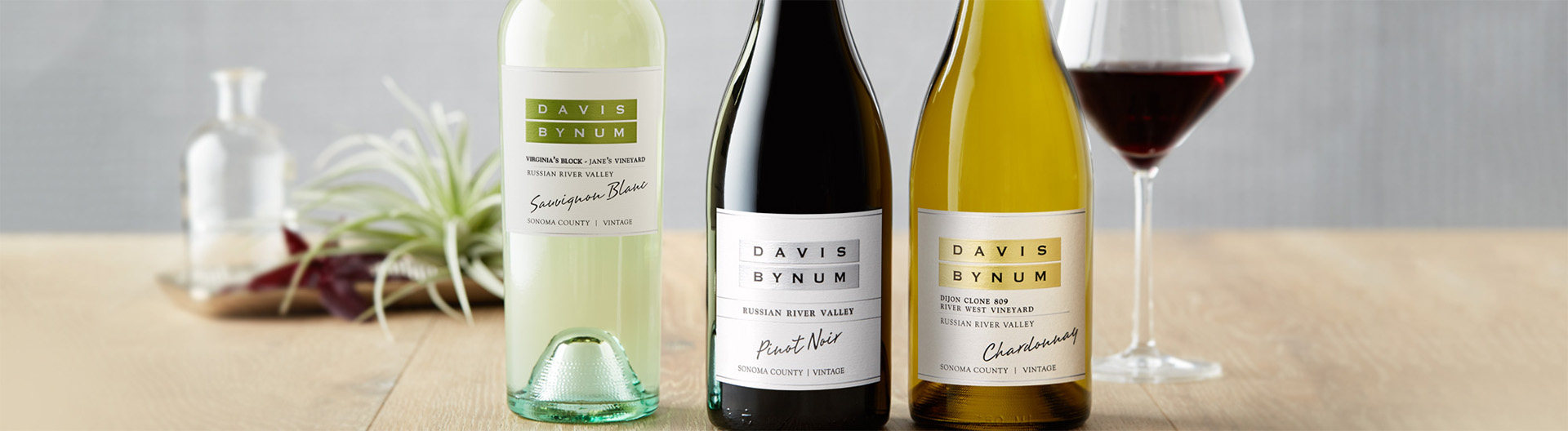 Three bottles of Davis Bynum wine on a table